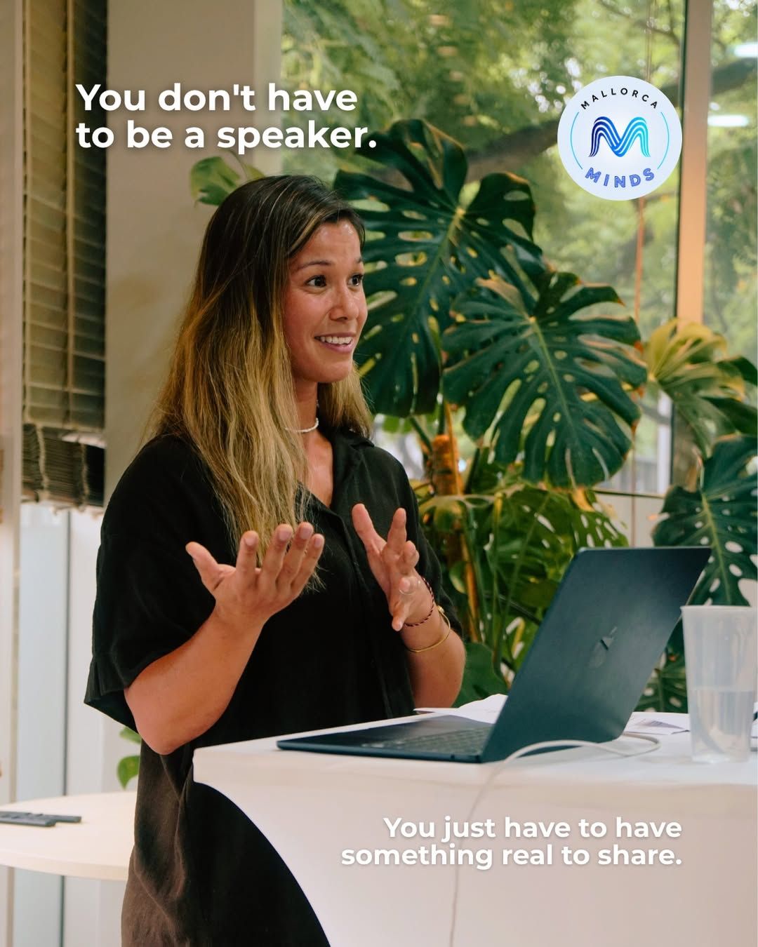 A Mallorca Minds speaker sharing an idea with the statement You don't have to be a speaker. You just have to have something real to share.