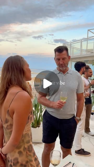 A short Mallorca Minds event montage showing guests talking and connecting in a relaxed social setting overlooking the sea.