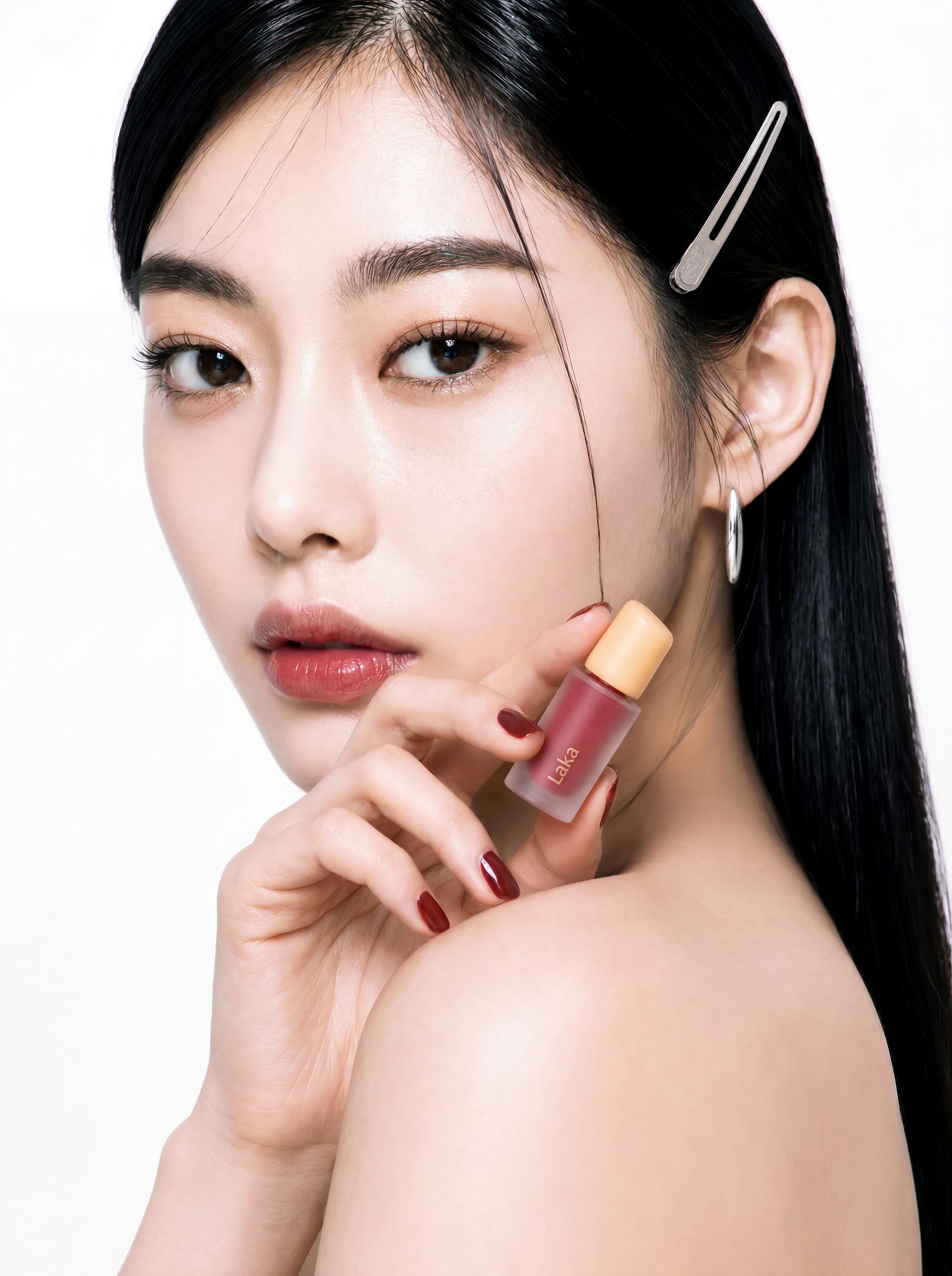 Neon Seoul skincare products with orange and blue neon rings