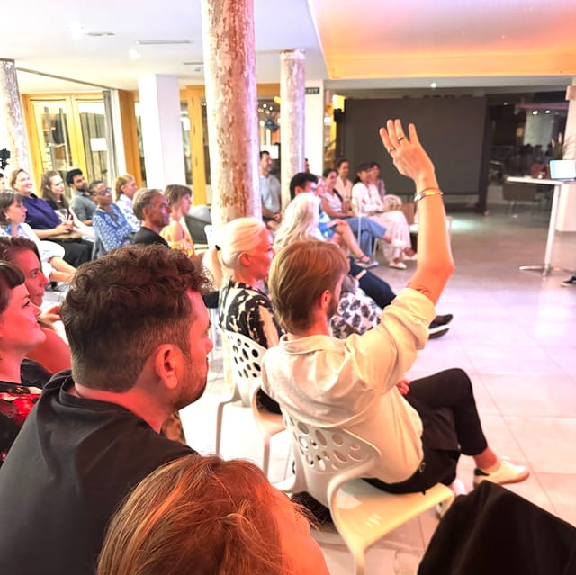 An audience member raising a question