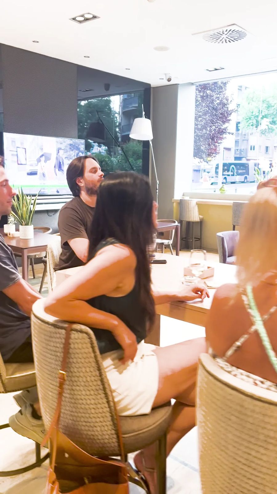 People meeting and continuing a conversation after an event